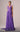 MNM Couture Purple Wedding Guest Gown with Draped V-Neck Bodice and Vertical Beaded Skirt Accents
