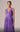 Close-up of the flowing Cape Train and Silk Fabric on the MNM Couture Gown, Purple