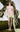 MNM Couture Pink and Green Cocktail Dress: High Neck Mini Dress with Floral Sequin Embroidery and Oversized Bow
