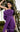 Close-up of MNM Couture Purple Gown, highlighting the Pleated Strapless Bodice and Braided Knotted Waist detail