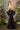 Andrea & Leo black strapless evening dress with large satin back bow, train, and silver diamond pattern