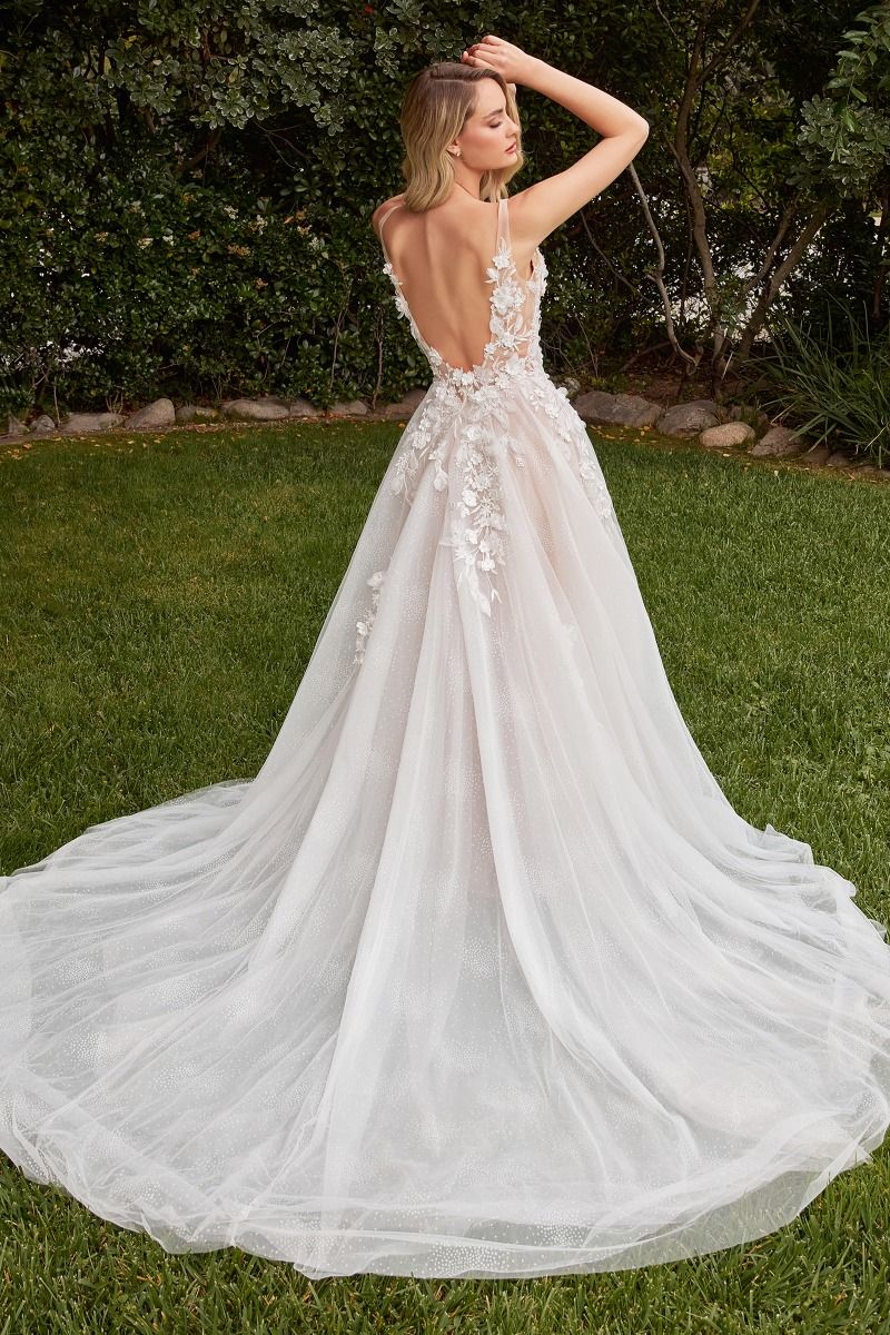 Model is showcasing the back of the Cinderella Divine CDS436W wedding dress