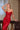 Close-up of Ladivine J888 red strapless sweetheart bodice with corset-style beading and sparkle