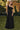 Ladivine one-shoulder black chiffon maxi dress featuring a draped off-the-shoulder neckline and long flowing skirt, perfect for formal events.