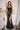 Ladivine Black Prom Dress: Fitted Satin Gown with Cowl Neckline, Corset Bodice, and high Thigh Slit