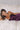 Ladivine Eggplant Prom Dress close-up, showcasing the Ruched Corset Bodice, Cowl Neckline, and fitted satin texture