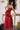 Ladivine Red Gown Back View, showcasing the Ruched Corset Lace-Up Back and Fitted Satin Silhouette for Prom