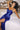 Ladivine Royal Prom Dress with fitted Corset and Ruching, model seated