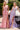 Ladivine iridescent sequin mermaid gowns in pastel pink and lavender, featuring low V-necklines, high slits, and a shimmery floral pattern, ideal for prom.