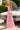 Back view of the Ladivine pink iridescent sequin mermaid dress, highlighting the dramatic low-cut open back, illusion mesh side panels, and flowing train.