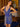 Model posing in the Primavera 3843 dress in royal blue