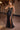 LaDivine C172 black strapless formal gown with fully beaded sweetheart bustier bodice, sheer plunging V-neck, high leg slit, and shimmering satin full-length mermaid skirt for prom or gala.