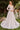 Model is posing in the Cinderella Divine CD862W wedding dress