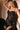 Model is posing in the Cinderella Divine CD868 dress in the color black 