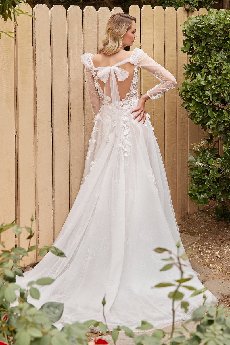 Model is showing the back of the Cinderella Divine CDS436W wedding dress