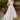 Model is posing in the Cinderella Divine CDS436W wedding dress