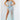 Model is wearing Jovani 04195 dress in the color aqua